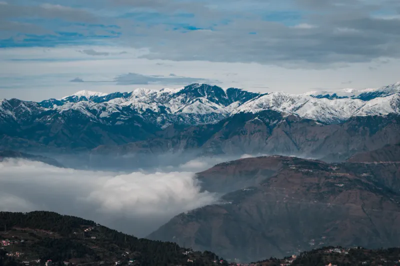 Snow ranges above the clouds, Jibhi, Himachal Pradesh